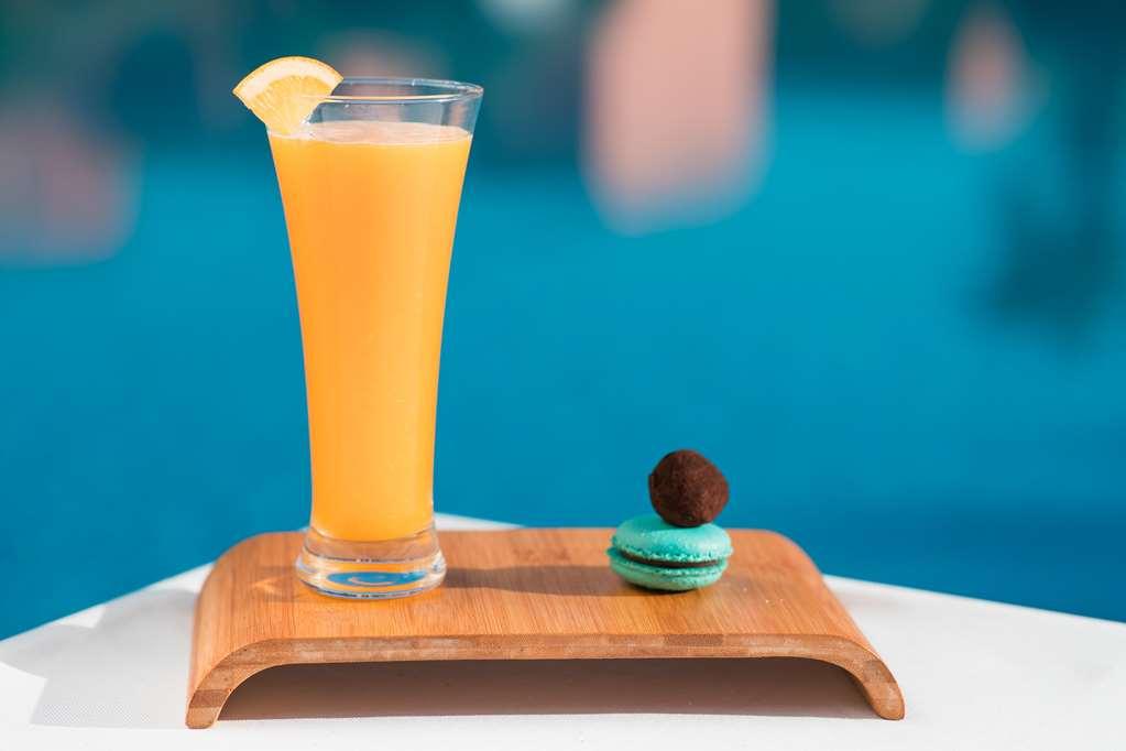 Mogador Aqua Fun & Spa Marrakesh Restaurant photo A glass of orange juice