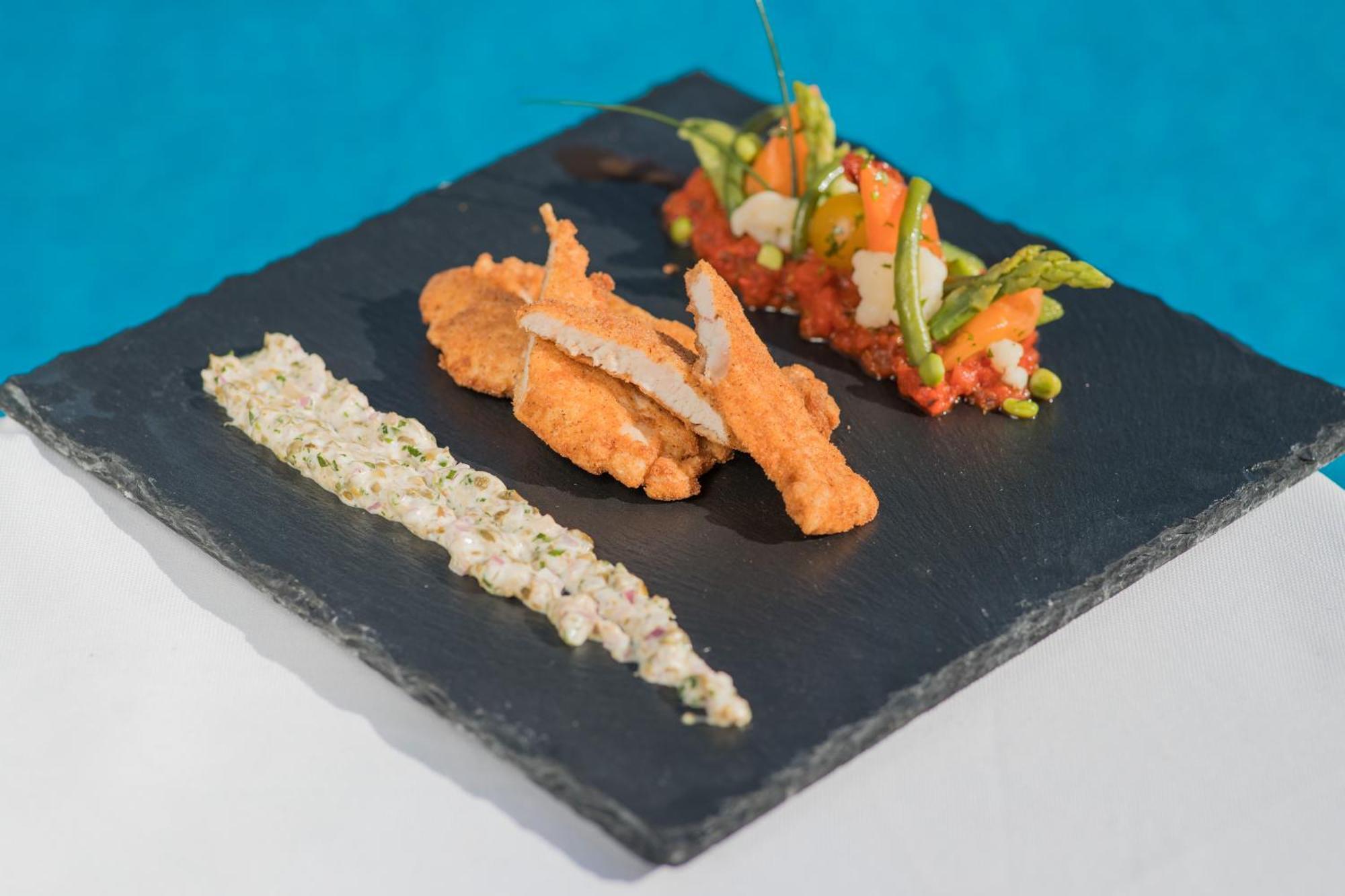 Mogador Aqua Fun & Spa Marrakesh Extérieur photo A slate plate with food