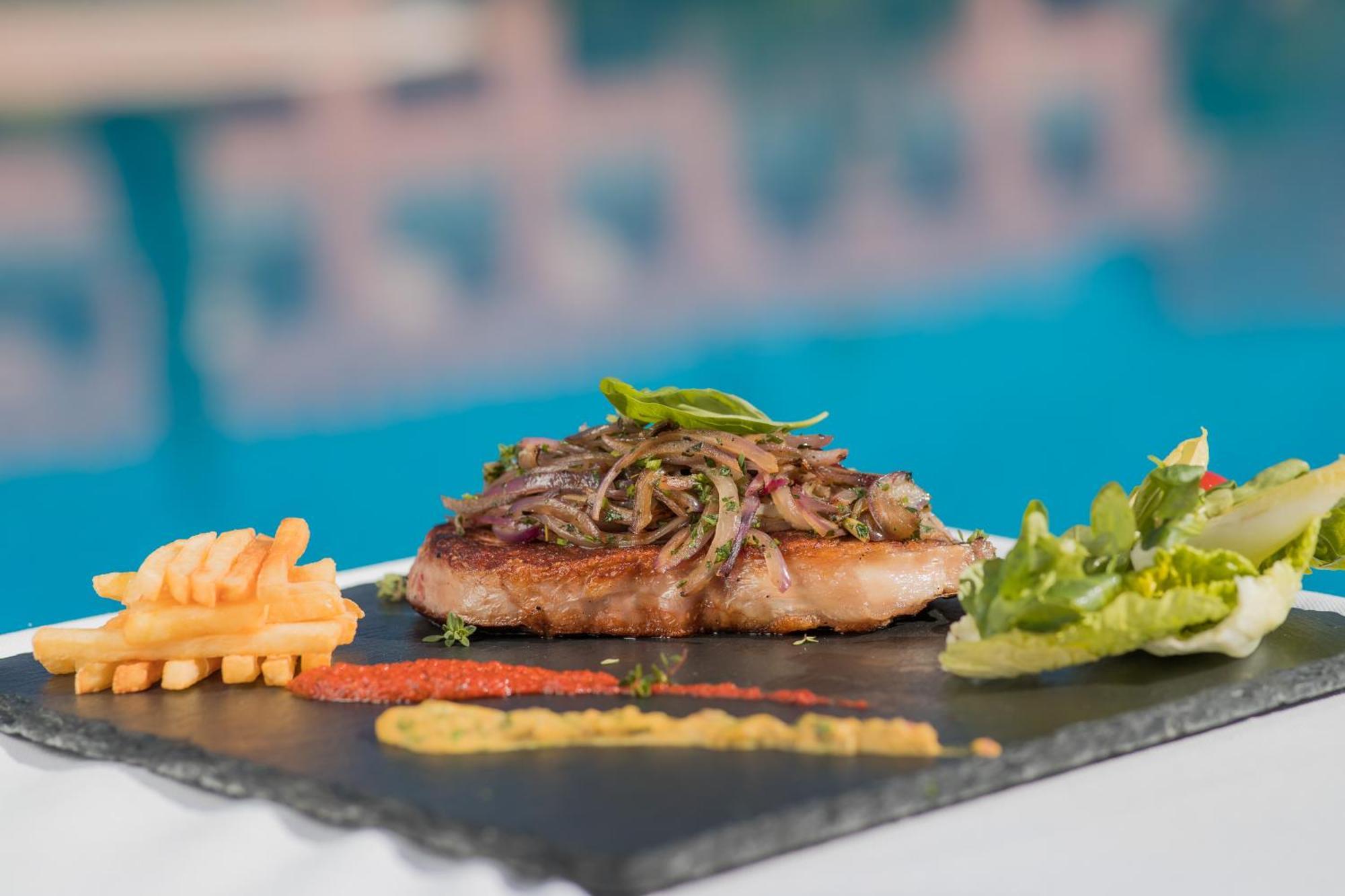Mogador Aqua Fun & Spa Marrakesh Extérieur photo A steak prepared with the method of cooking